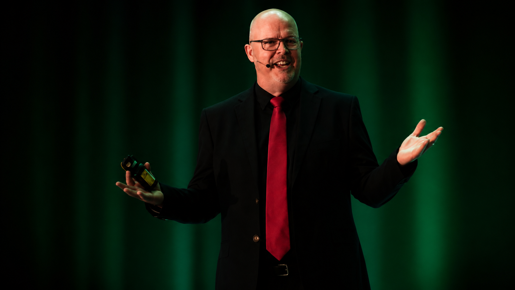 Sean Willard speaking on stage